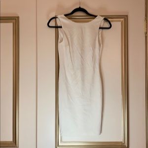 Zara white mini dress. Open back with ruffles.